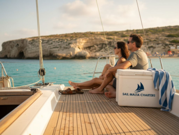 Couple relaxing on Malta sailboat deck
